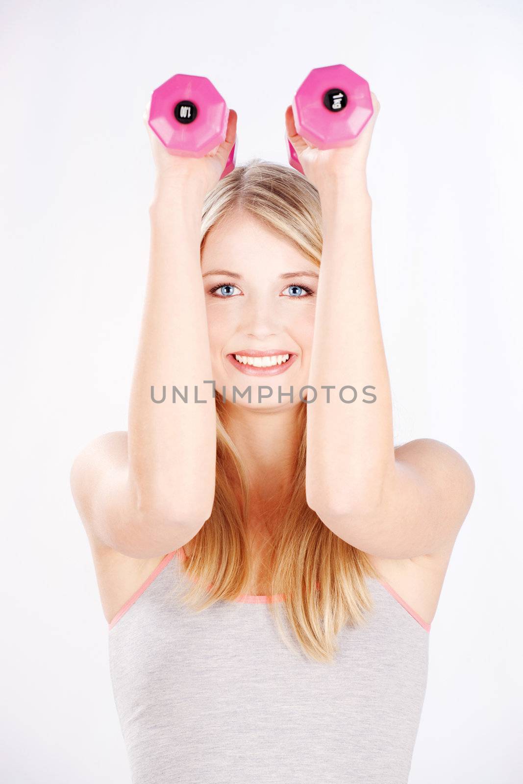 Young woman doing fitness exercises