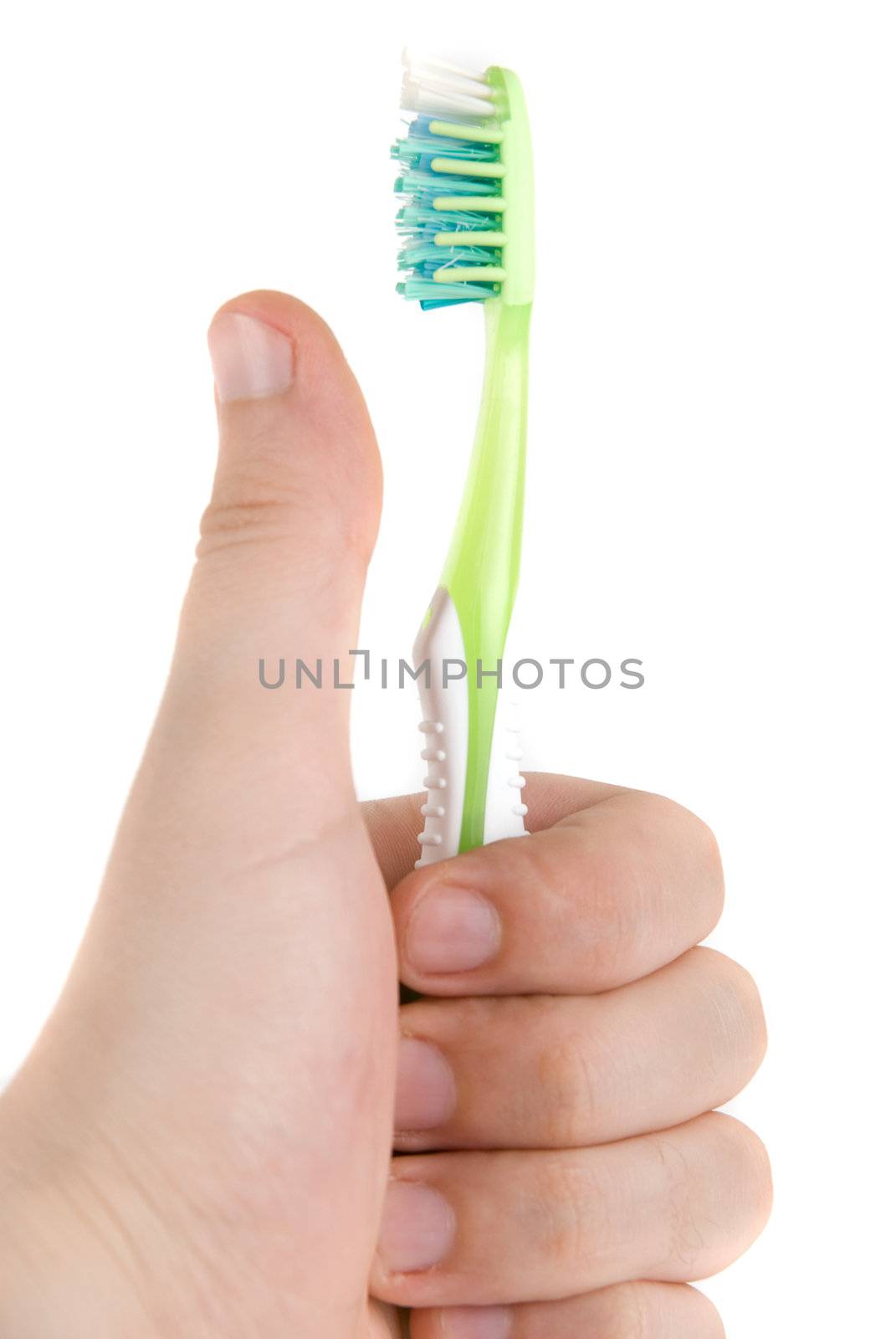 Hand with toothbrush by rusak