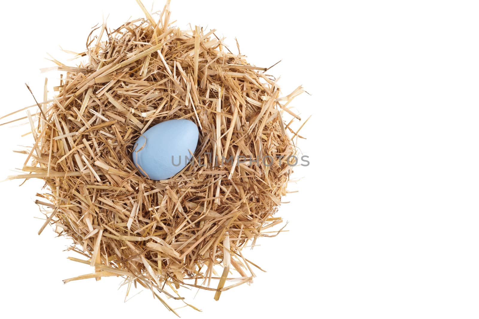 Straw nest with nice colored Easter eggs by 3523Studio