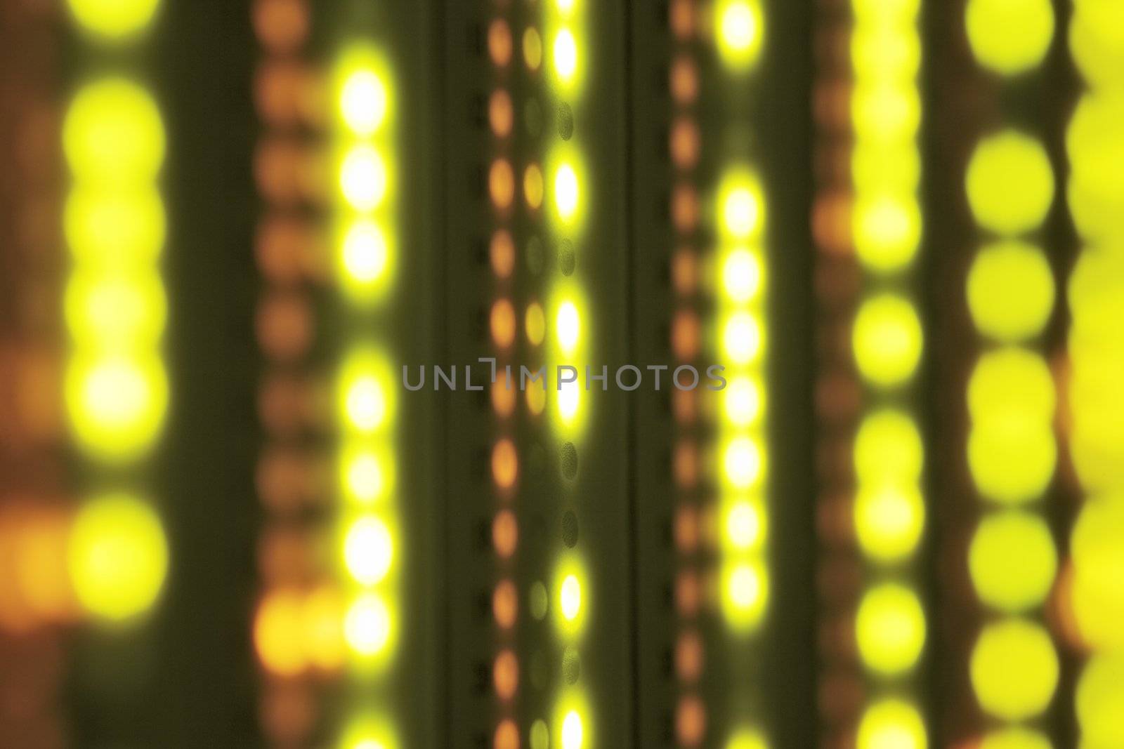 Abstract image of blinking led lights in a server room.