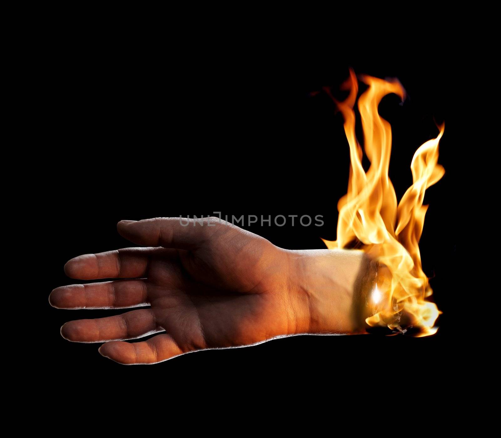 A Burning hand on black background.