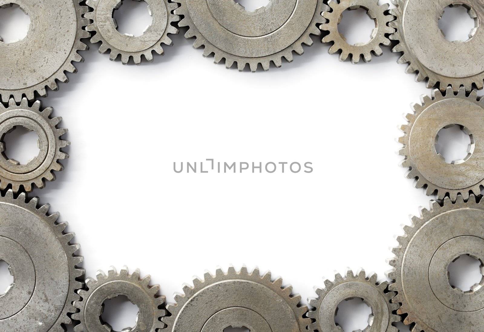 Background image with a frame made of old cog gear wheels.