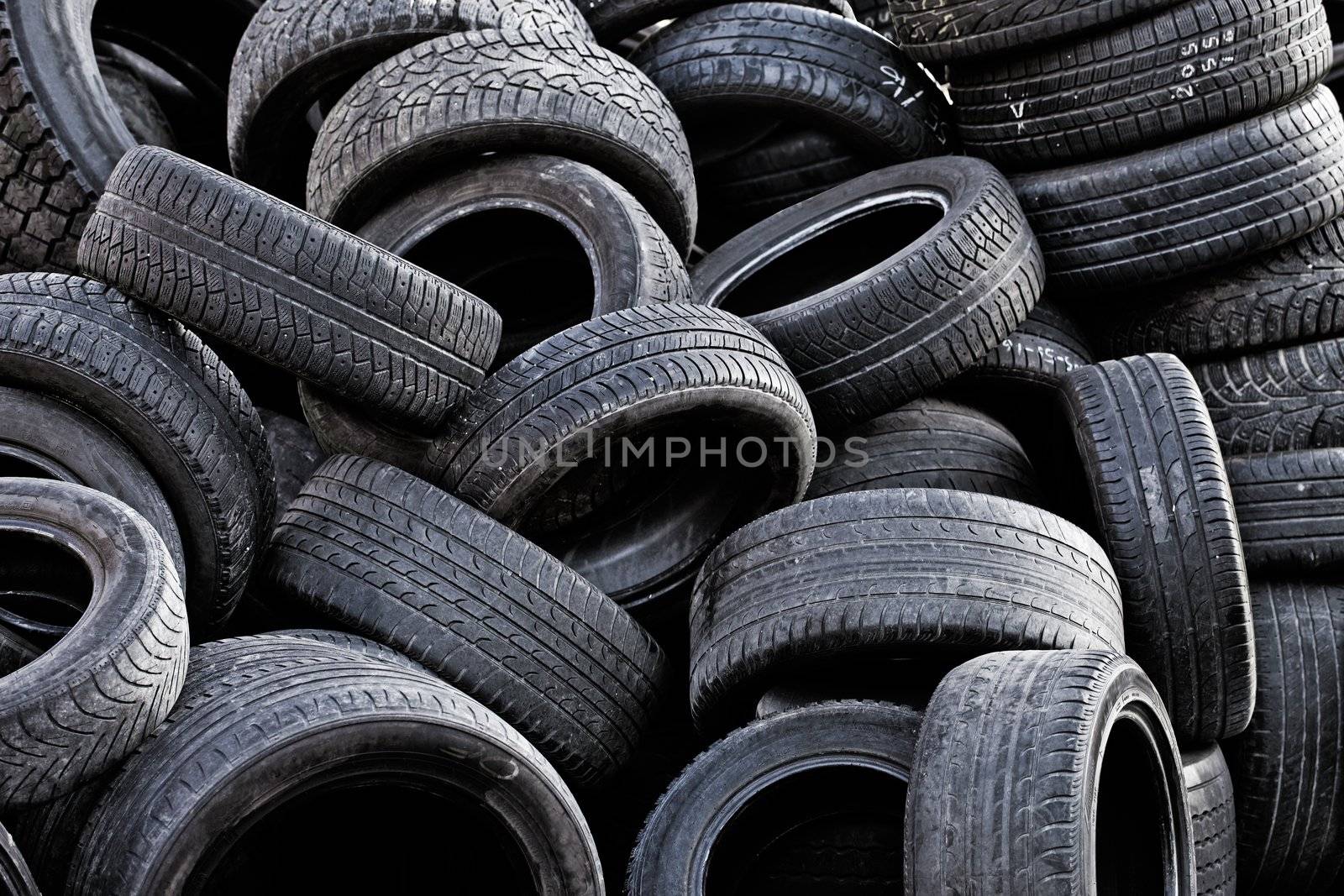 Pile of old used car tires.