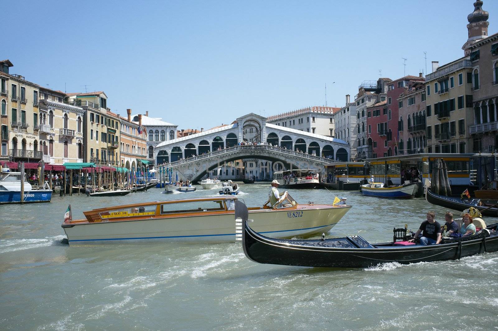 Venice, Veneto, Italy - May 25: The Grand Canal is a canal in Venice, Italy. It forms one of the major water-traffic corridors in the city. Public transport is provided by water buses and private water taxis, and many tourists explore the canal by gondola. May 25, 2011 in Venice, Veneto, Italy