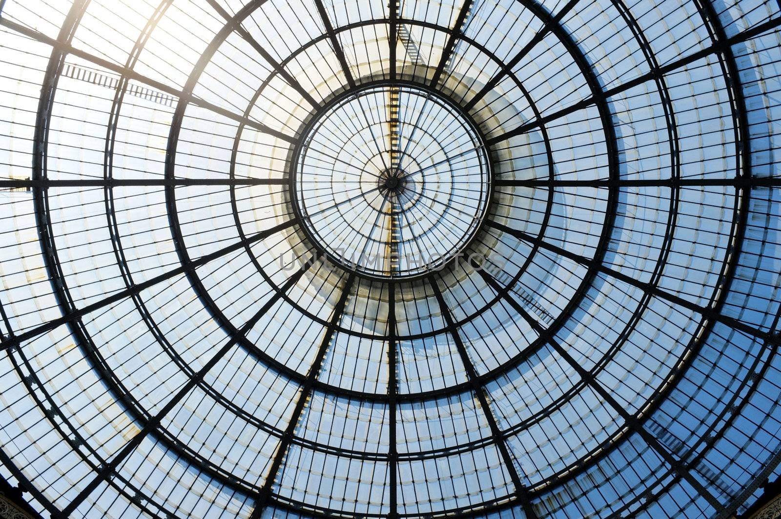 The old glass dome of Galleria Vittorio Emanuele II, Milan, Italy.