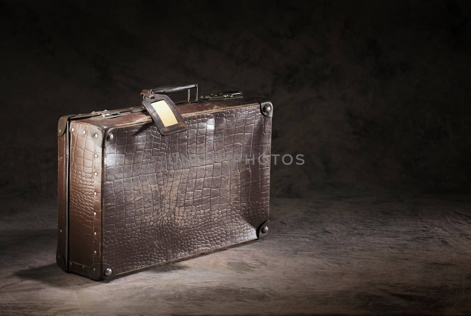 Forgotten suitcase by Stocksnapper