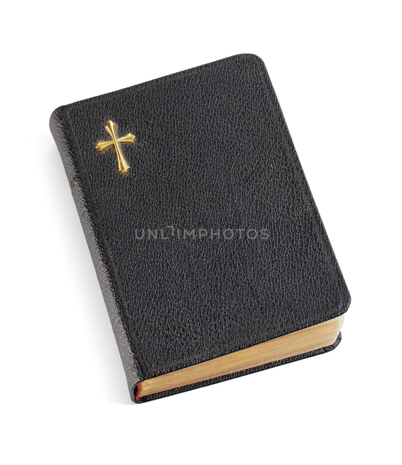 An old pocket-sized black bible isolated on white eith natural shadows
