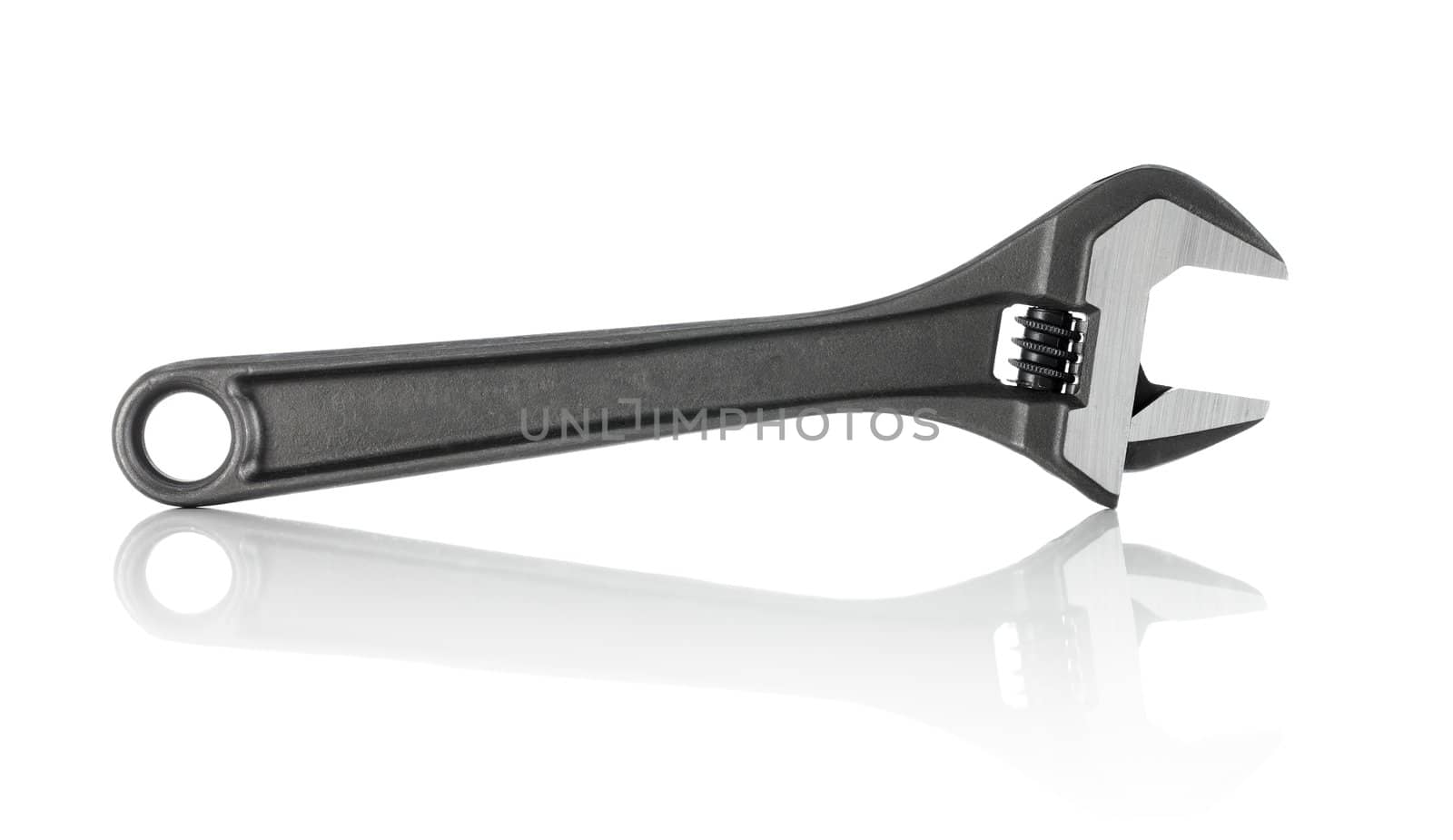 A new adjustable spanner isolated on white with reflection.
