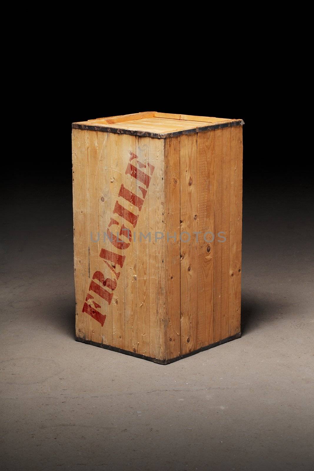 Mysterious old wooden crate with word "Fragile".