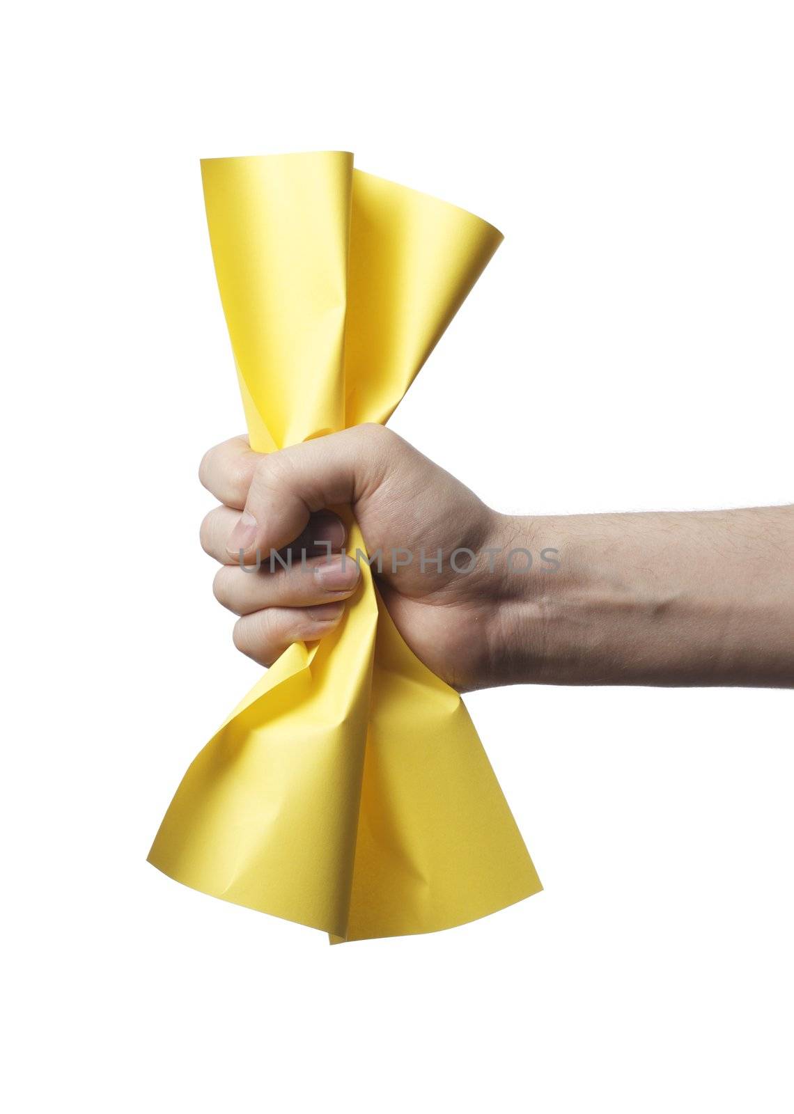 Hand holding a crumpled yellow paper.