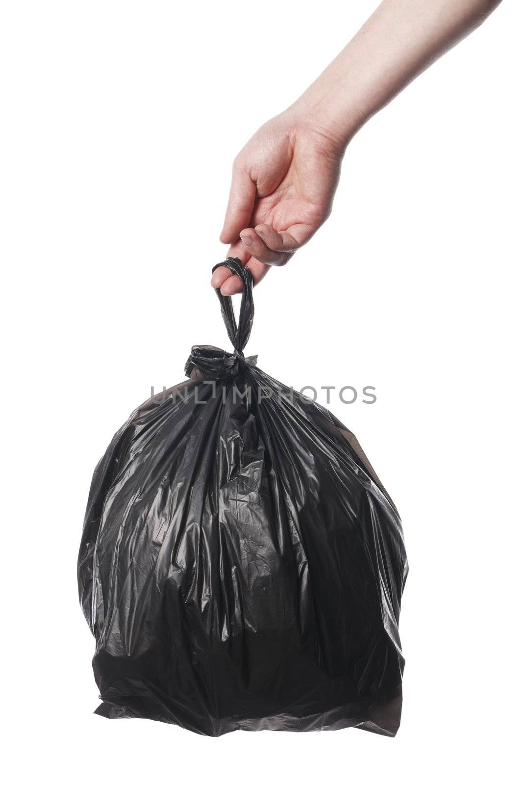 Man holding black plastic trash bag in his hand