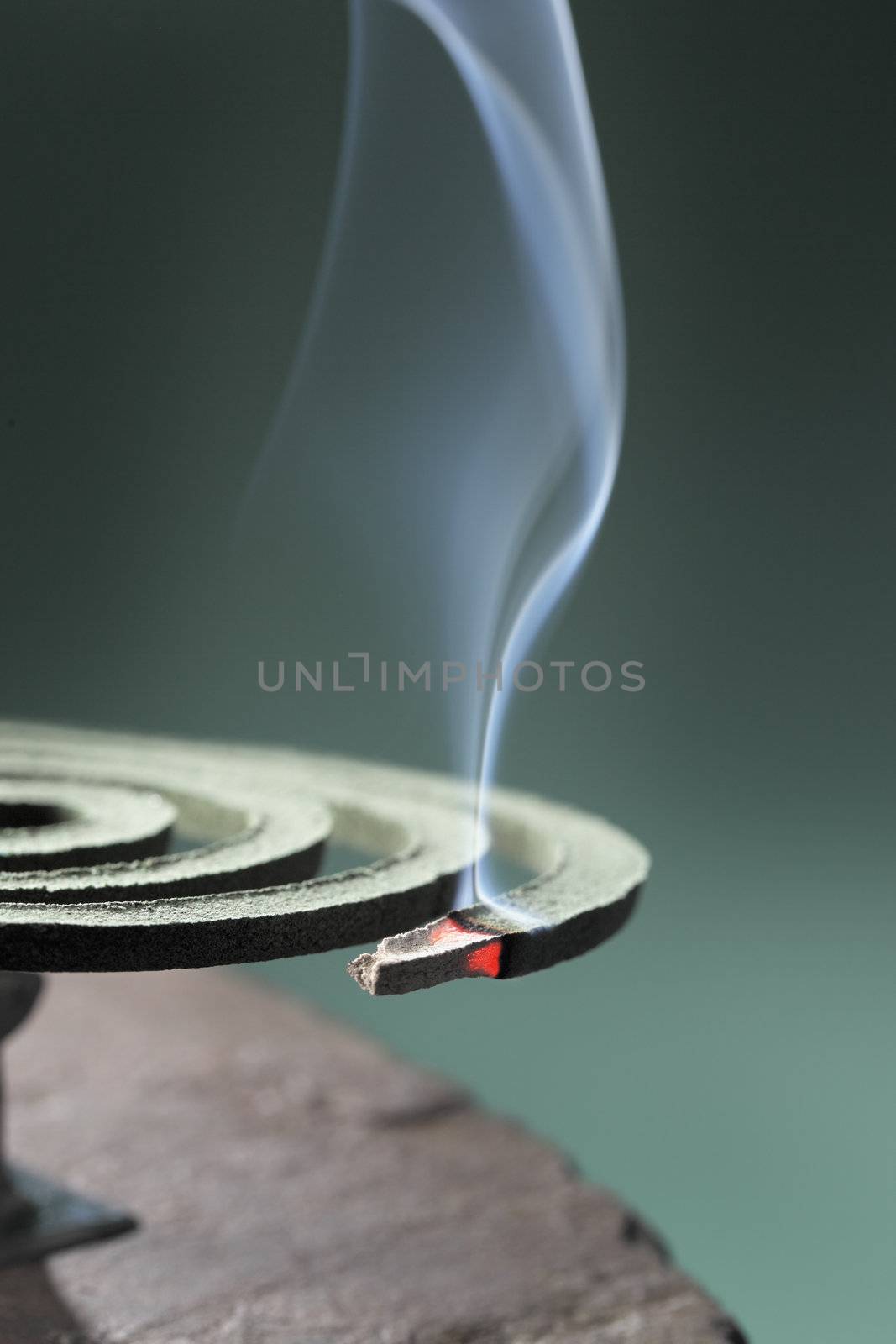 Mosquito coil is mosquito-repelling incense, usually shaped into a spiral, and typically made from a dried paste of pyrethrum powder.