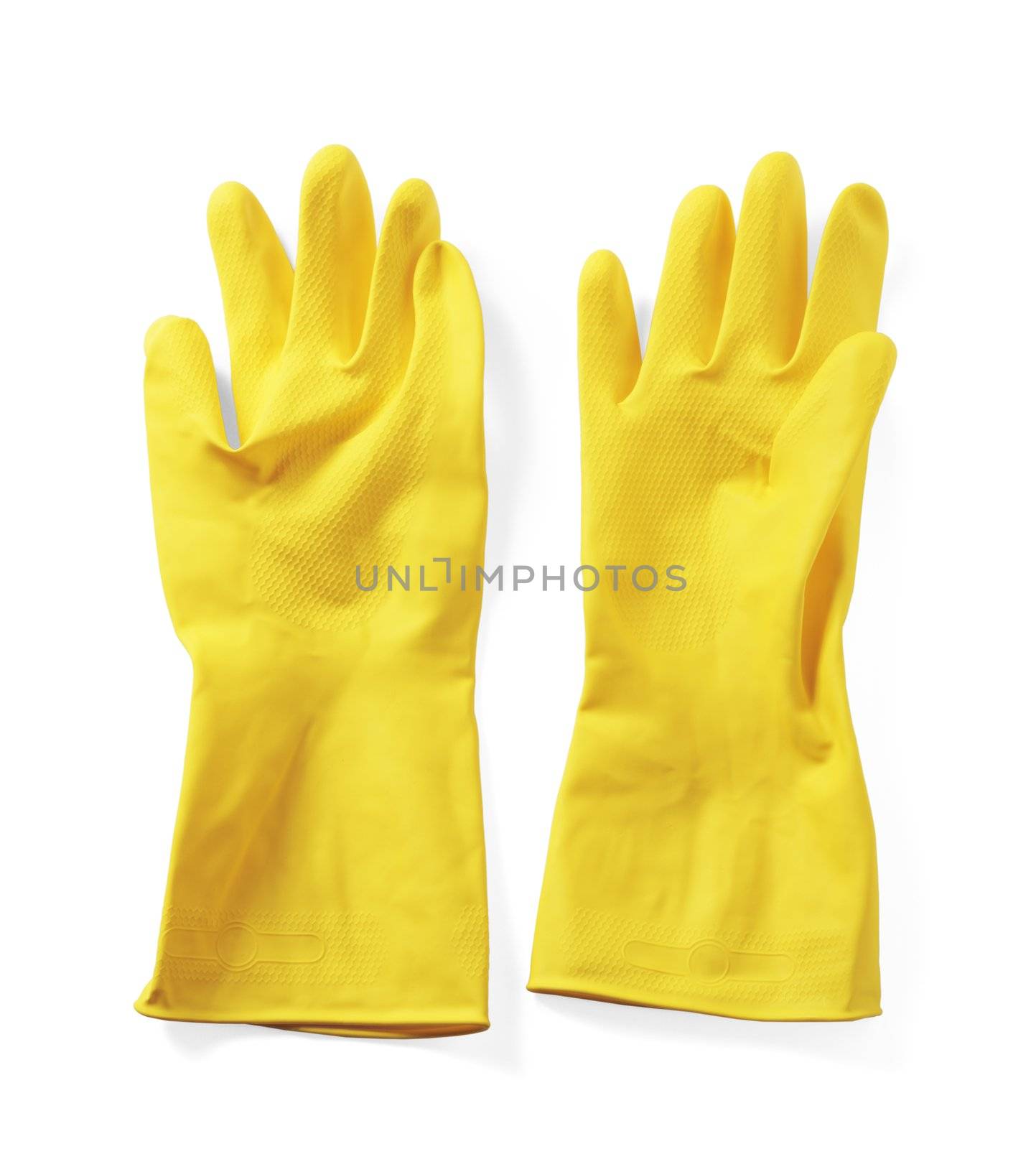 Yellow household protective rubber gloves on white