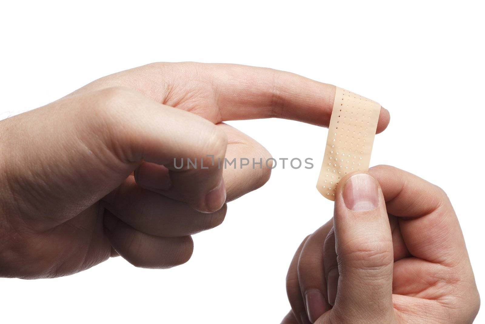 Man putting on an adhesive bandage