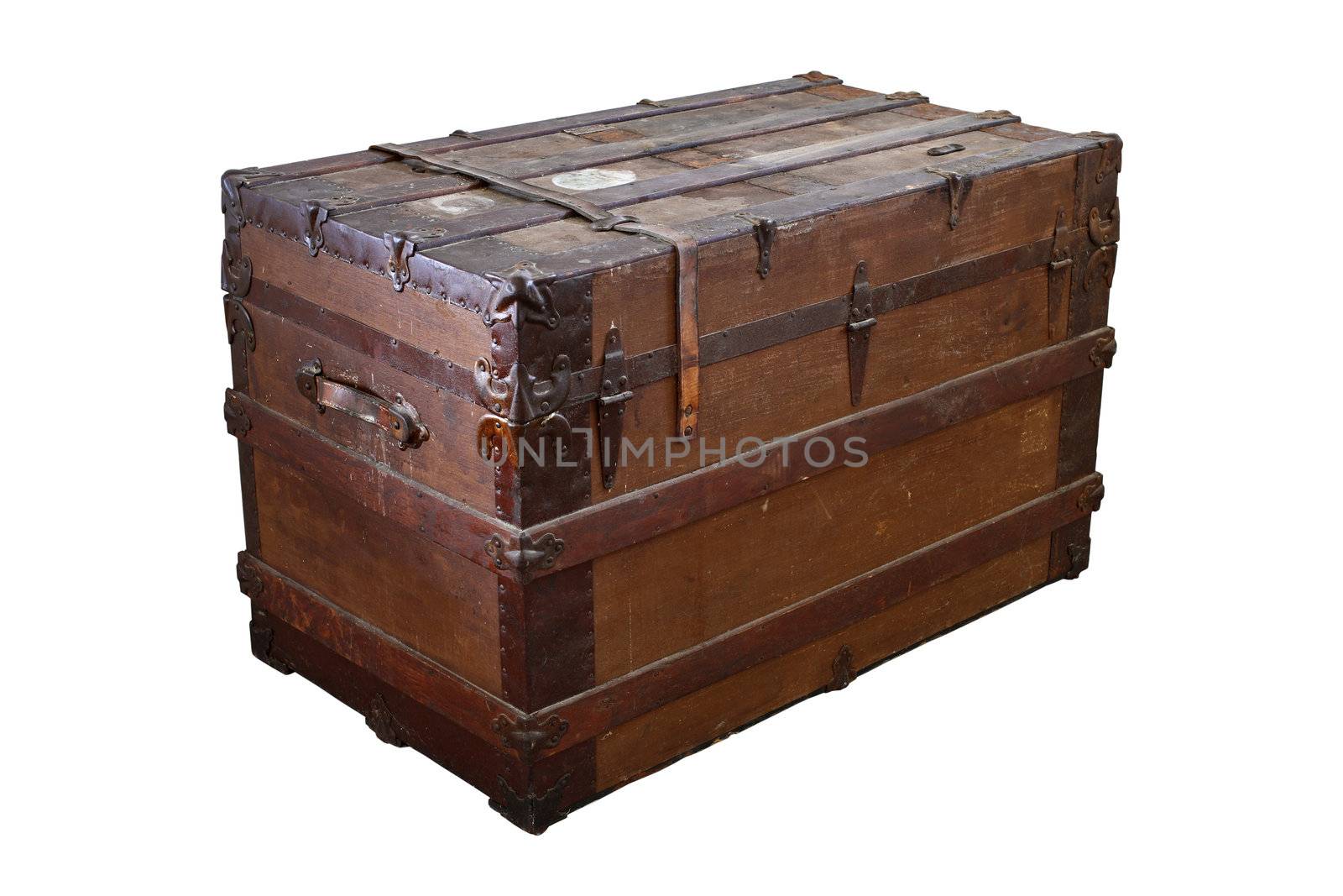 Old, worn and dirty steamer trunk isolated on white