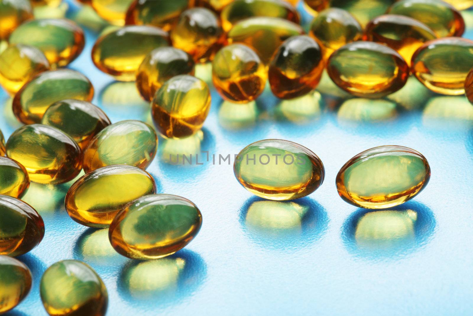 Fish oil pills by Stocksnapper