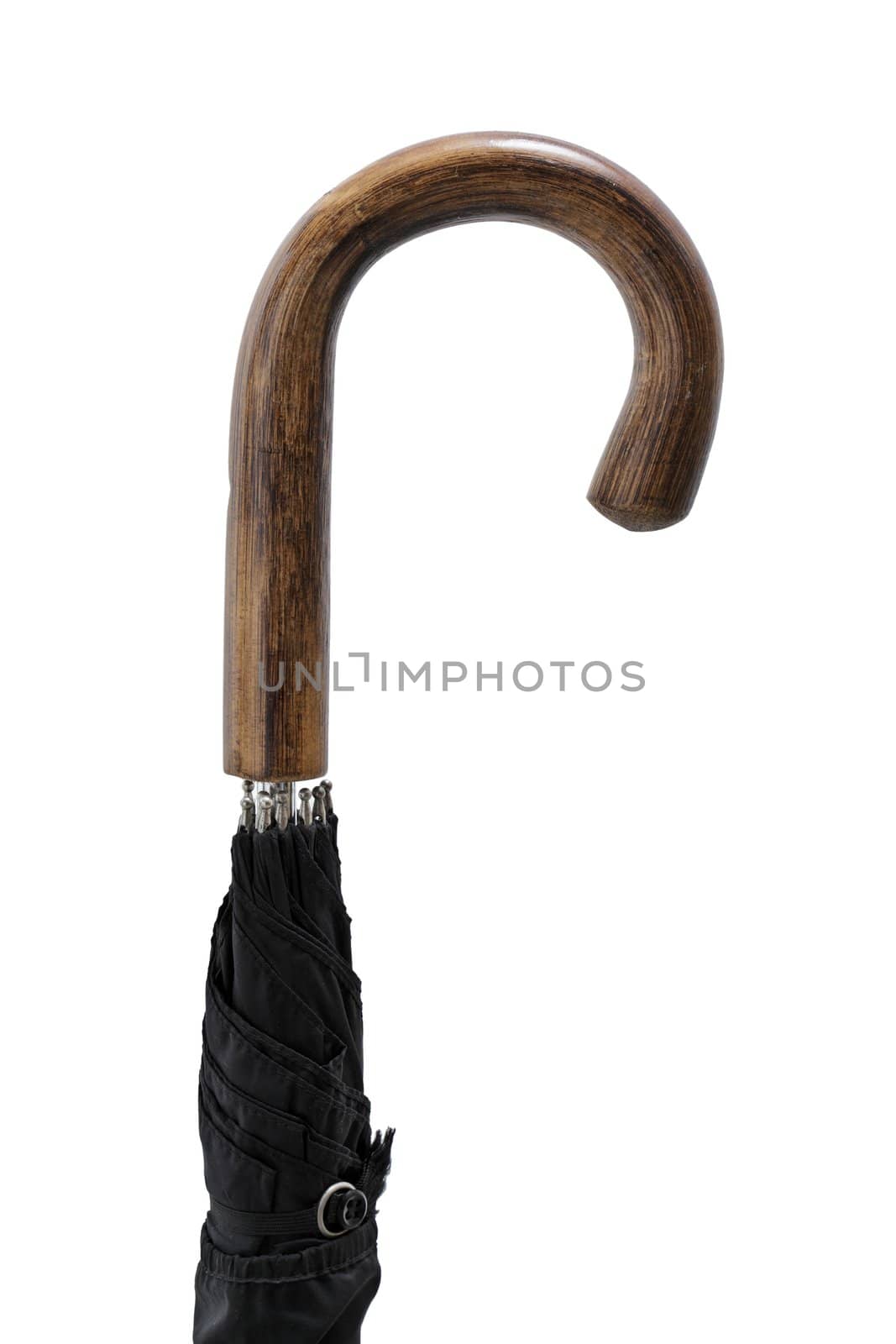 Old wooden umbrella handle against white background.