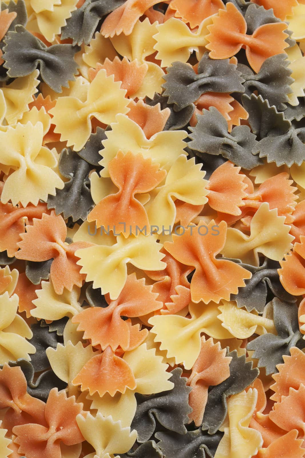 Three colored uncooked pasta texture