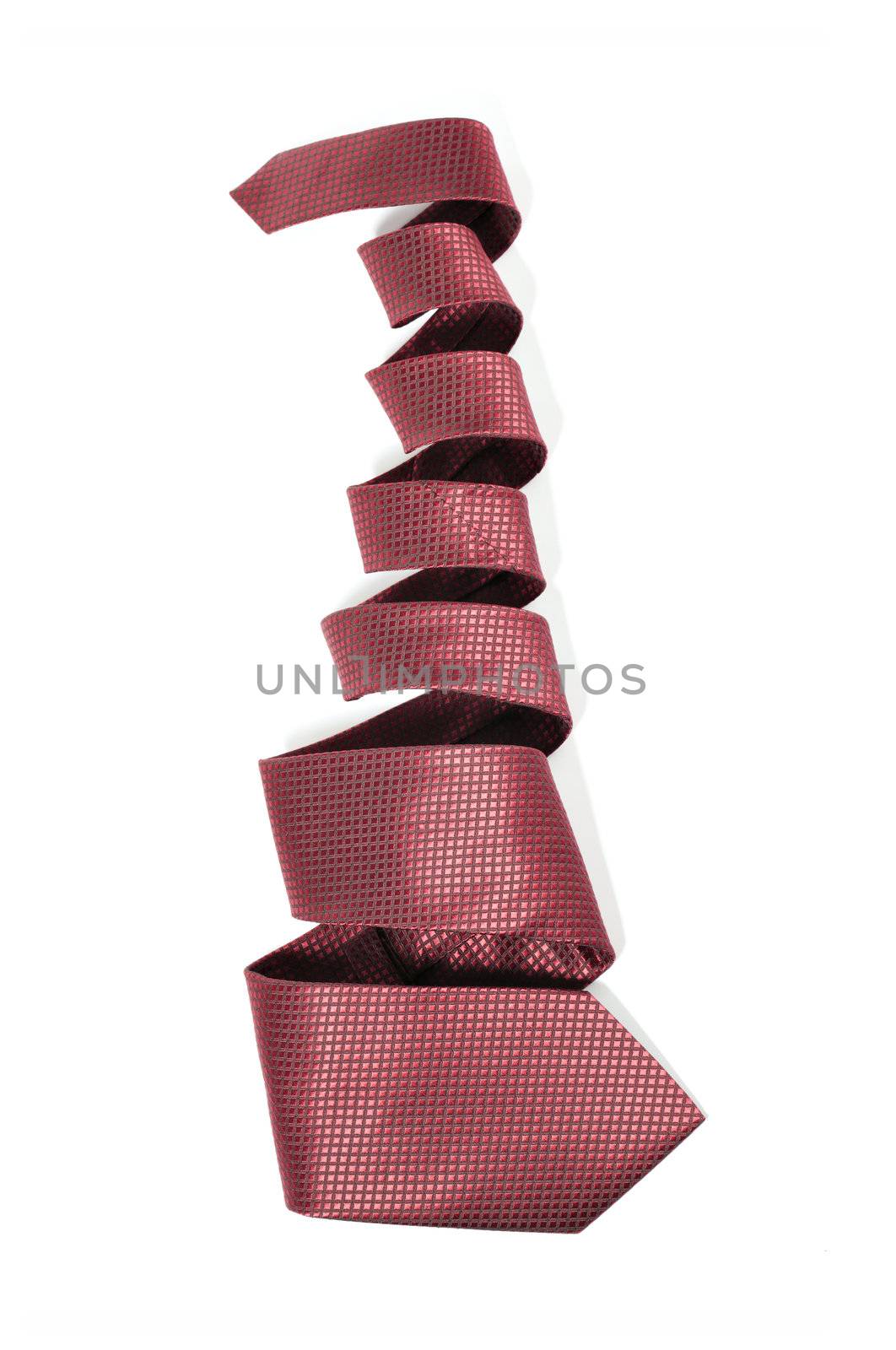 Red silk tie on white background