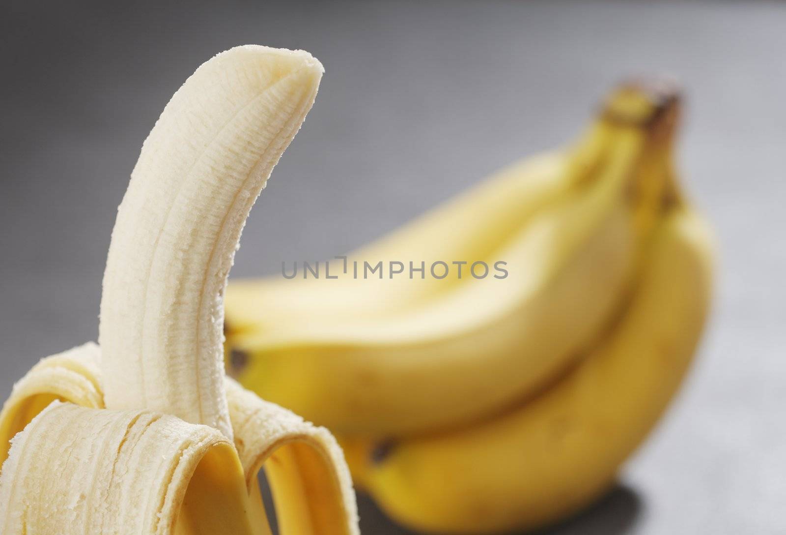 Peeled banana fruit in closeup