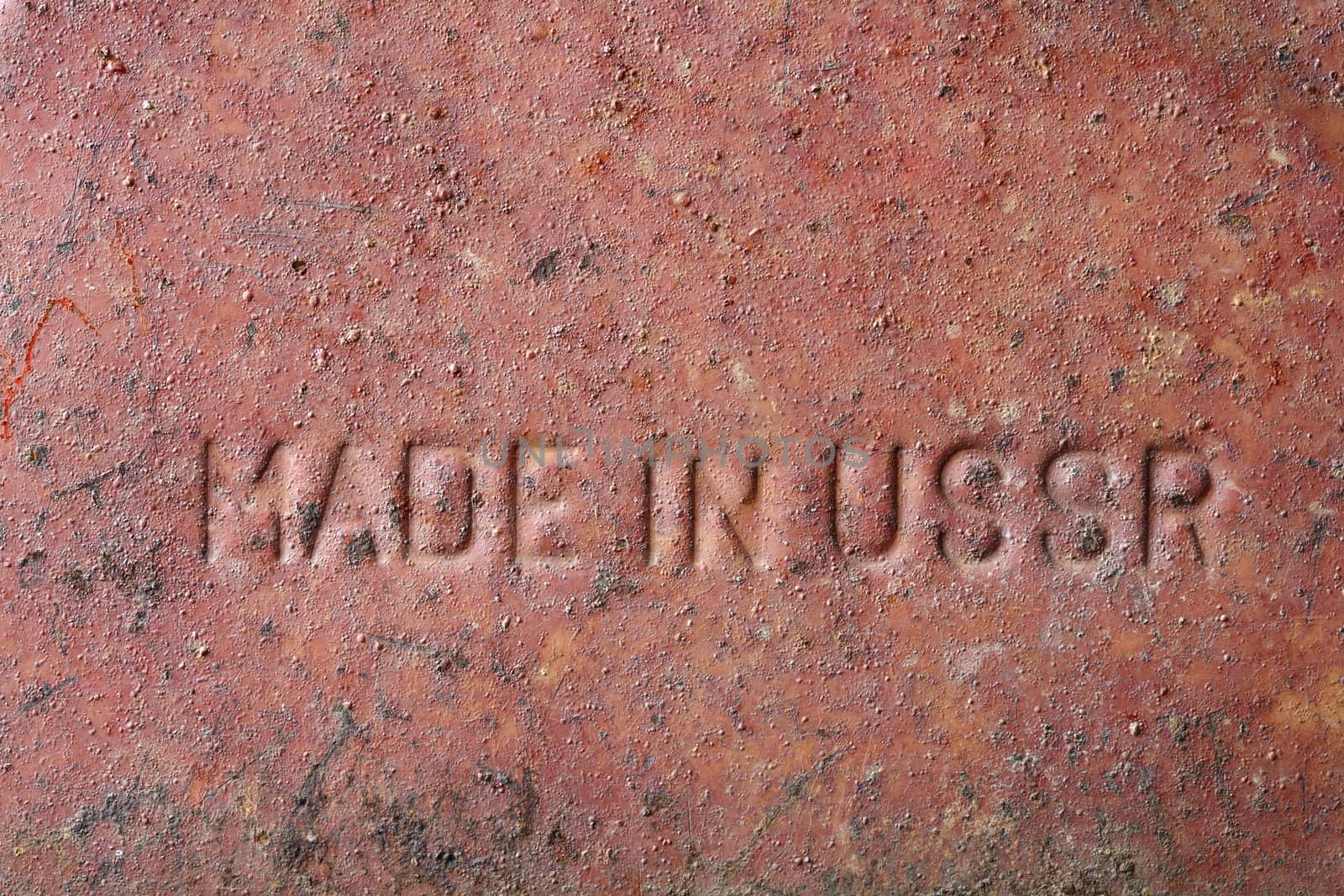 "Made in USSR" text imprinted on an old metallic gasoline can