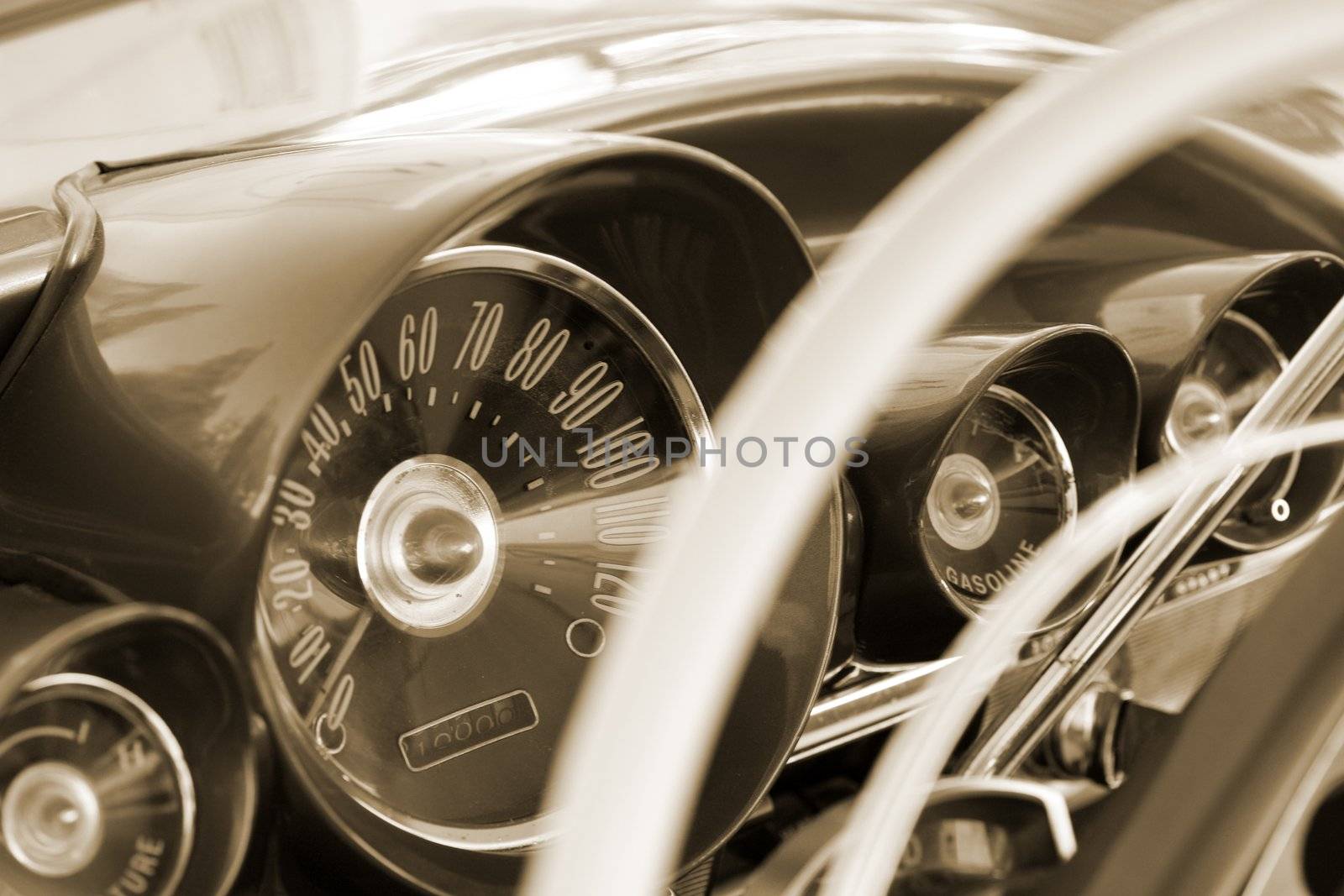 Vintage car control panel. Sepia toned.