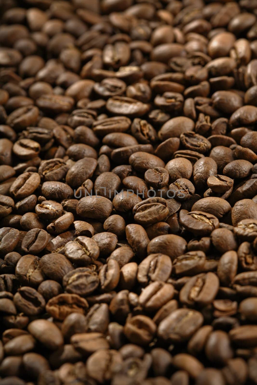 Roasted coffee beans. Shallow depth-of-field