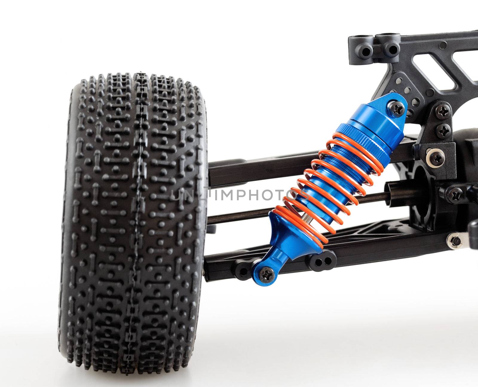 suspension of modern radio controlled car for competitions on white background
