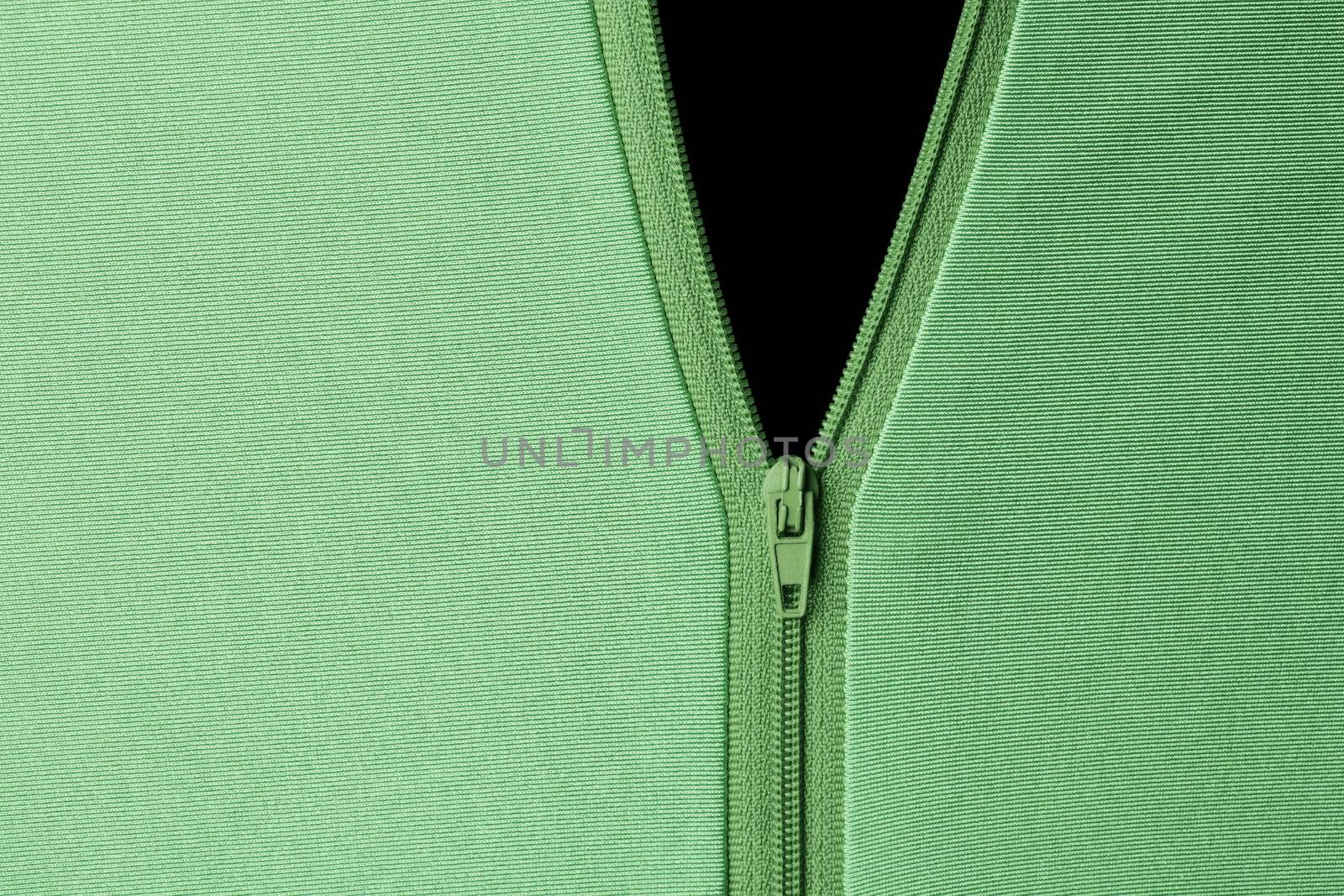 Green opened zipper revealing black background