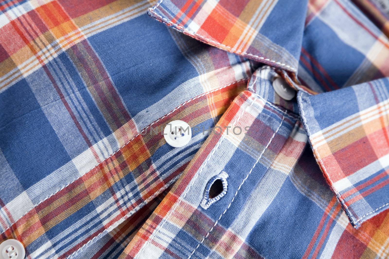 bright multi-colored plaid shirt with a collar by Serp
