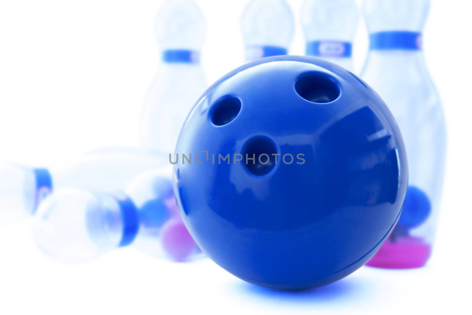 pins and ball for play in bowling on a white background