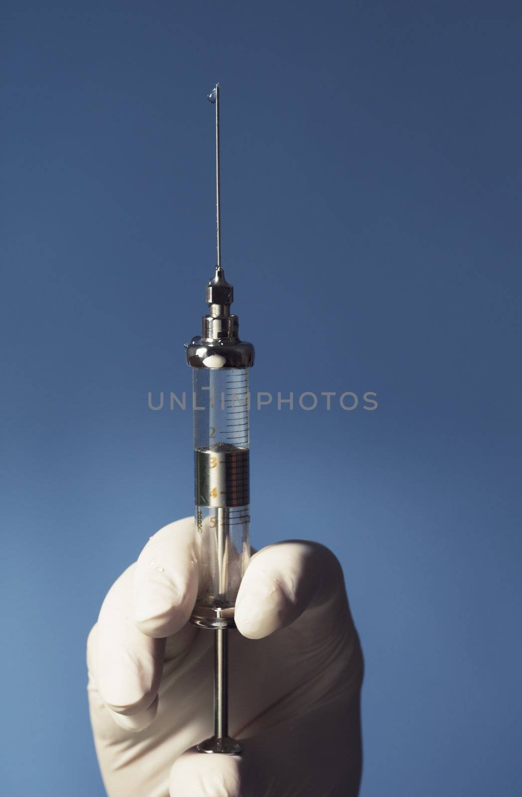 Scary old syringe made of glass and with a thick needle