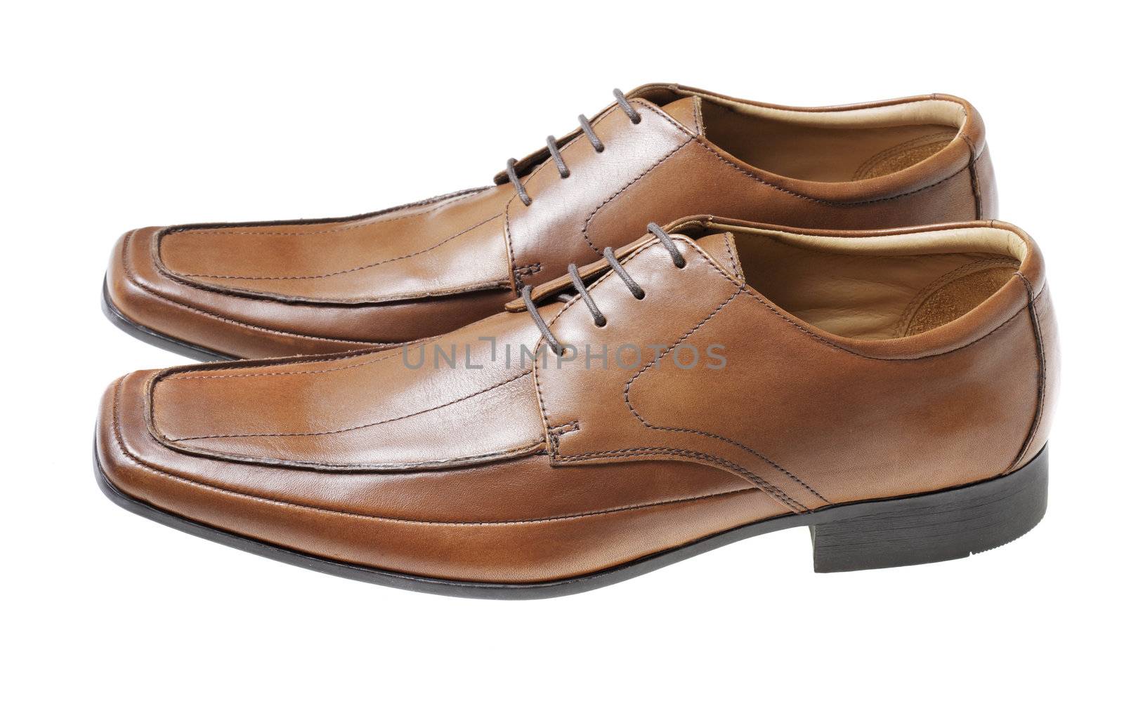 Men's brown leather dress shoes isolated on white
