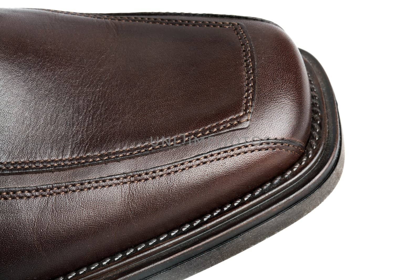 Detail of a men's brown leather shoe