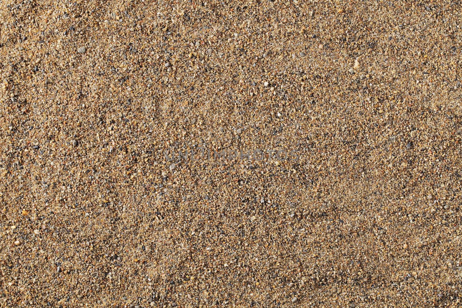 Texture made of natural coarse sand from the sea.