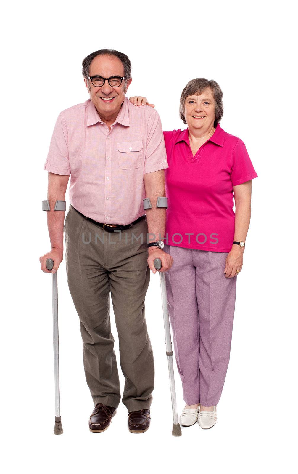 Woman supporting her handicapped husband isolated over white background