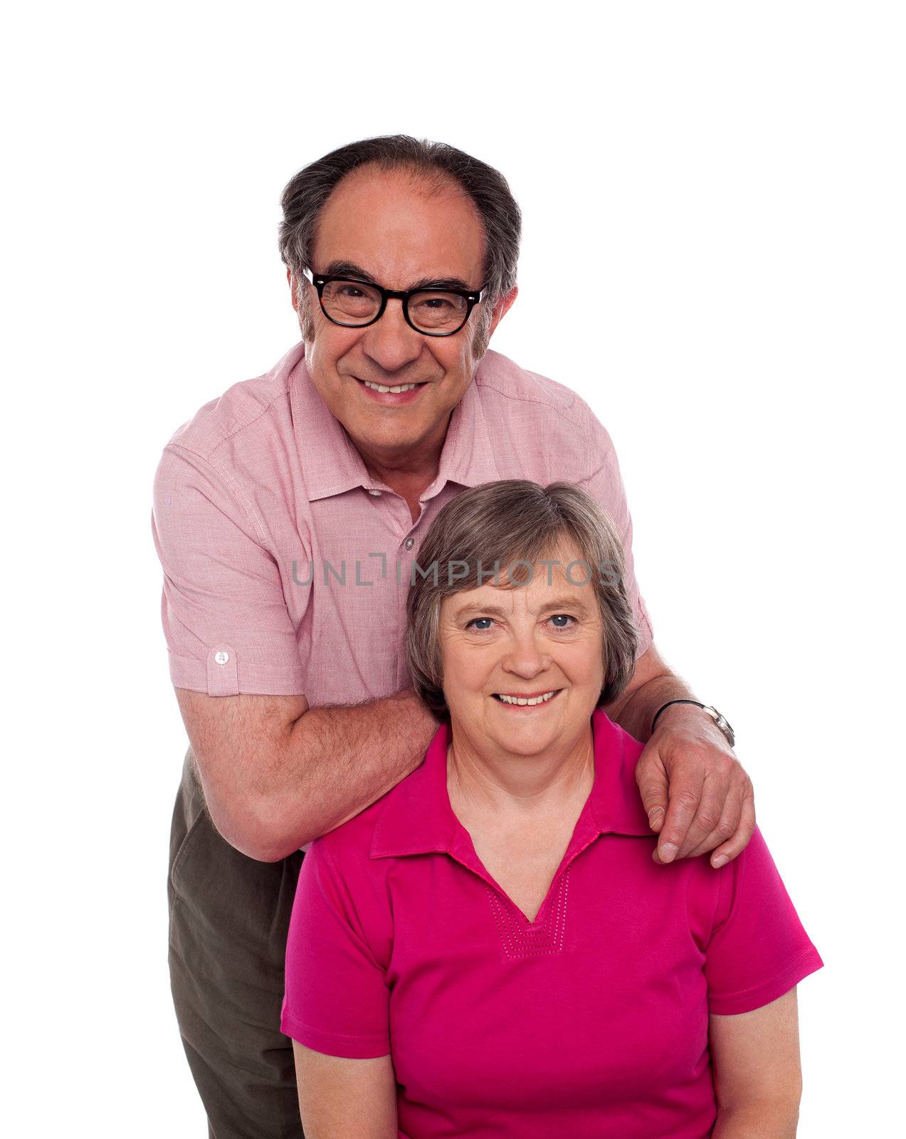 Lovely family posing for a photo shot, in studio. All on white background