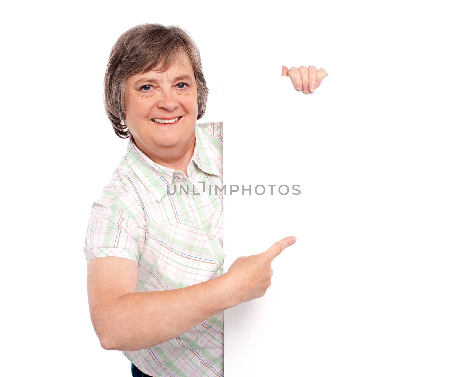 Attractive woman presenting an advertising board isolated against white background