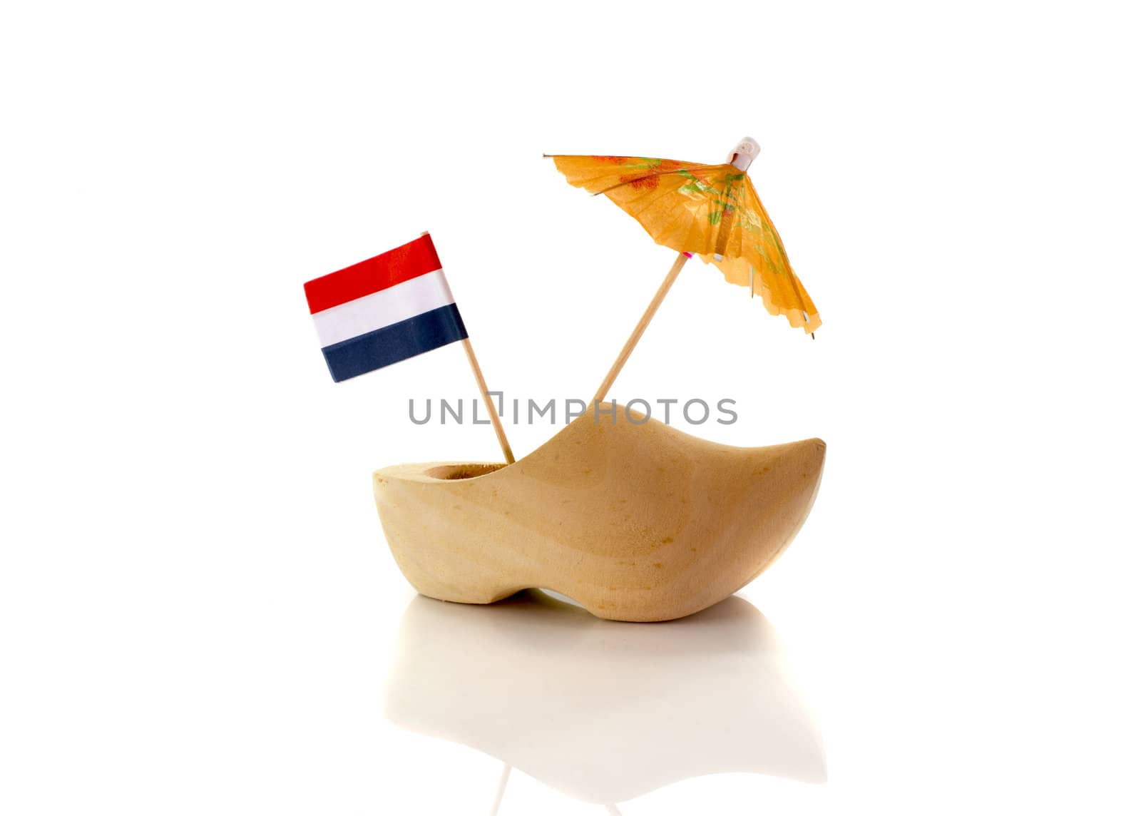 dutch wooden shoe with netherland flag in orange red white and blue