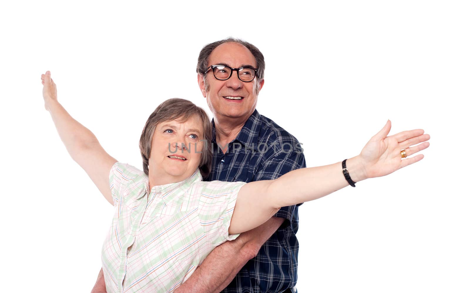 Senior love couple looking away. Woman posing with open arms