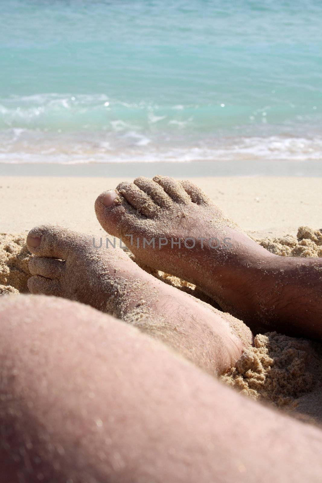barefoot on the beach by photochecker