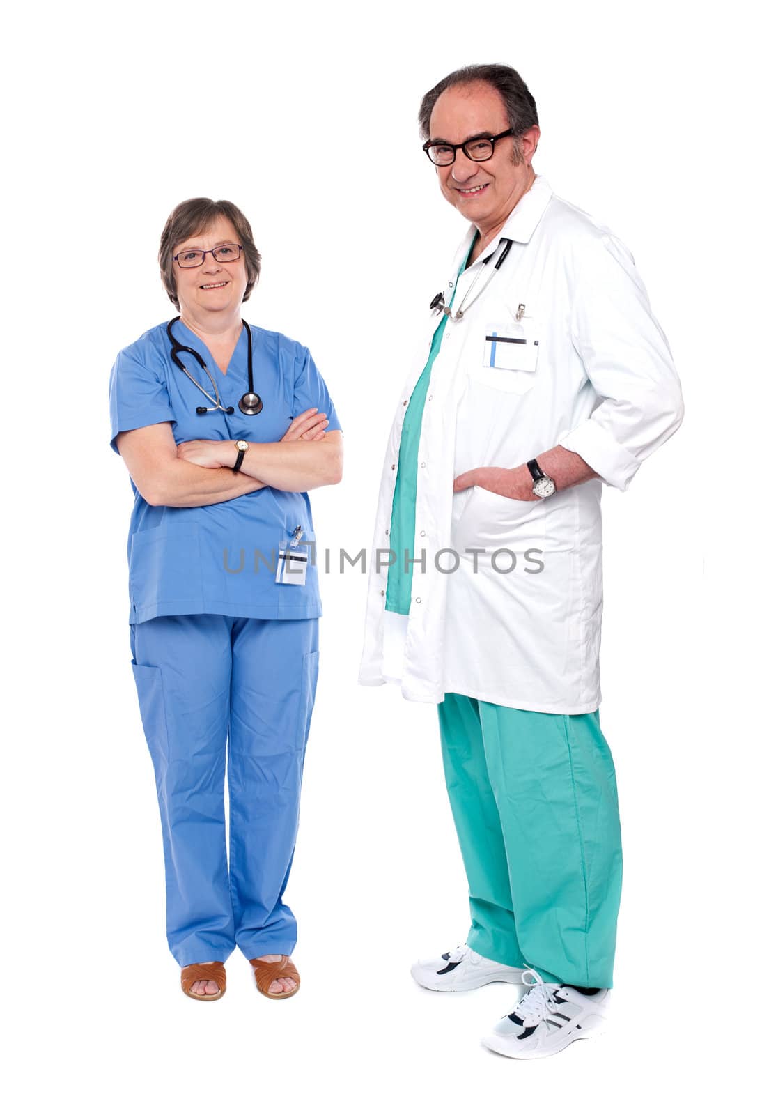 Smiling and relaxed medical professionals by stockyimages