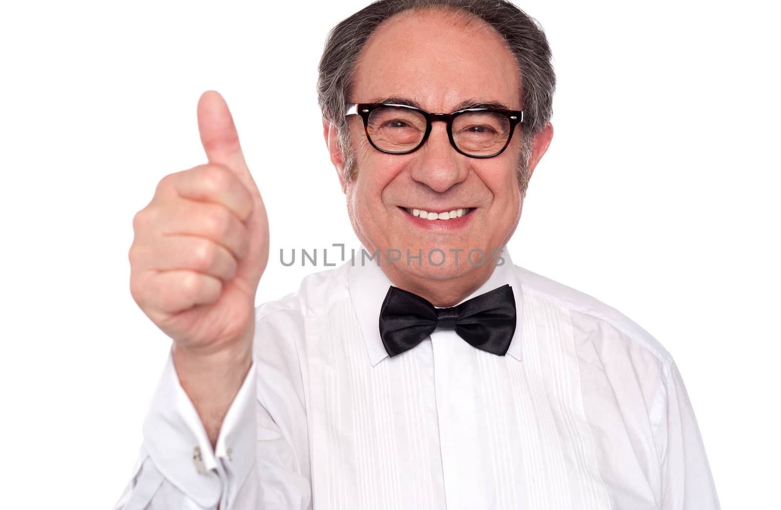 Closeup of senior male showing thumbs up to camera