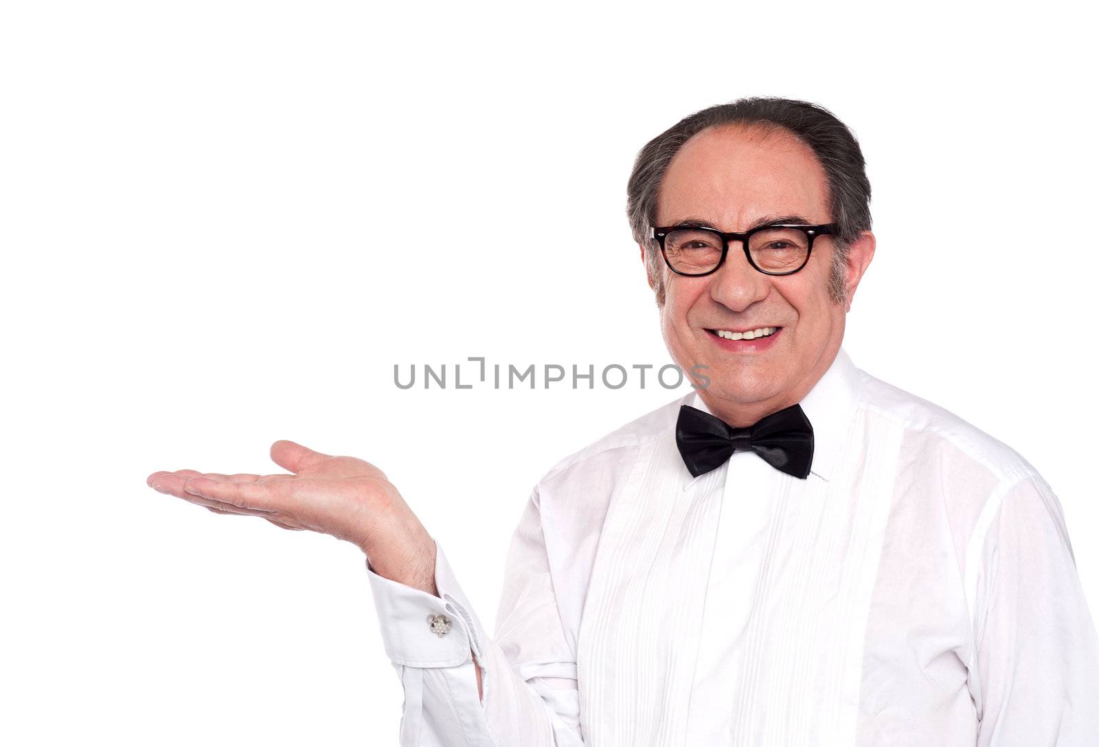 Elegant senior male representing copy space isolated against white background