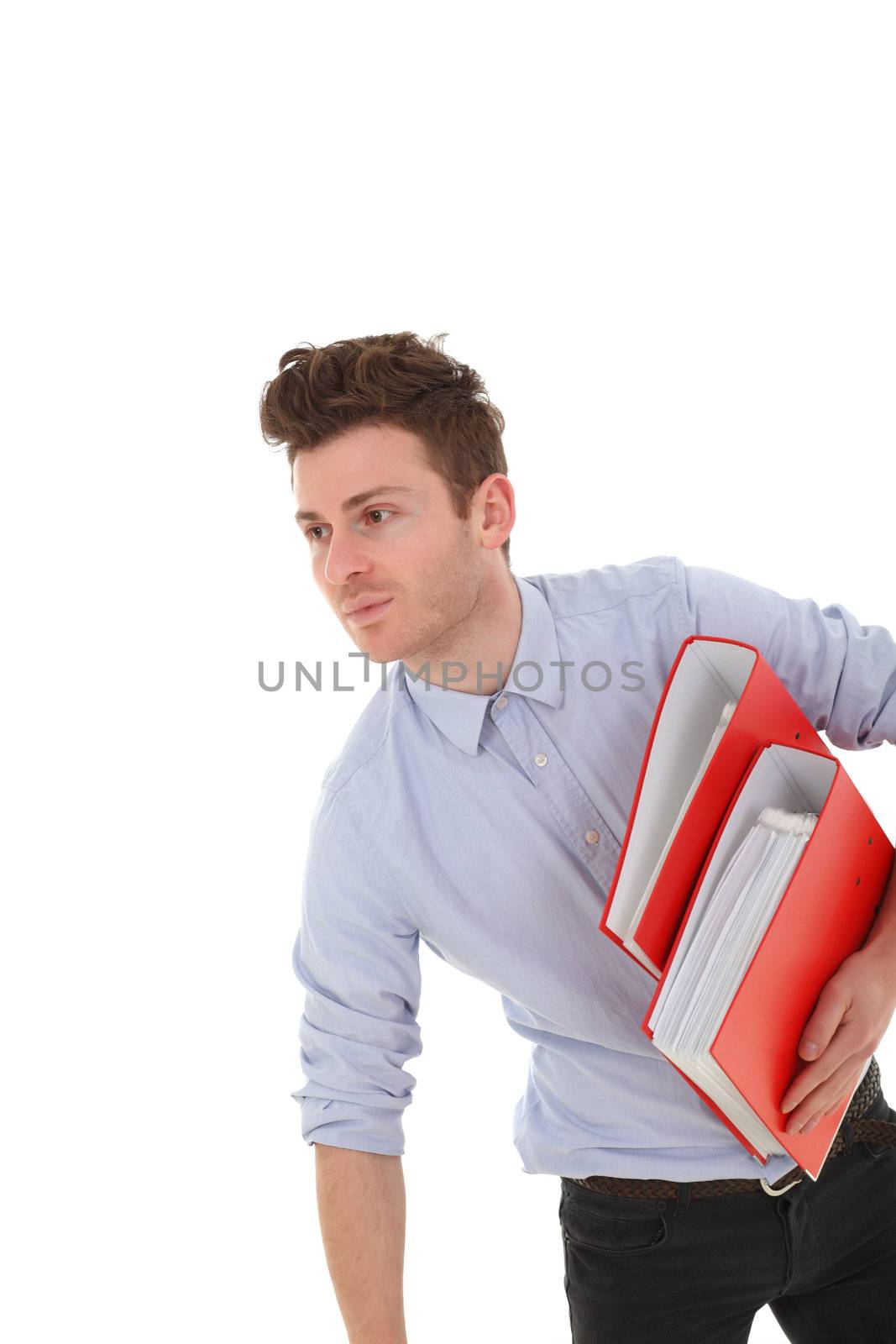Artistic portrait of young employee with red folders