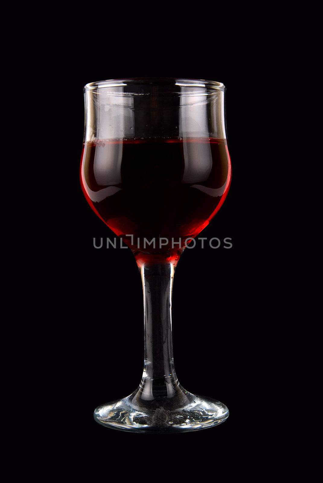 red wine on black background