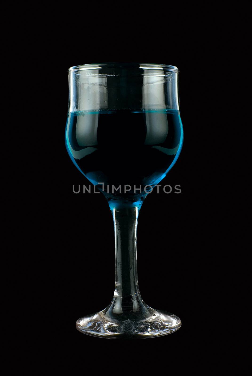 Blue wine on isolated black background