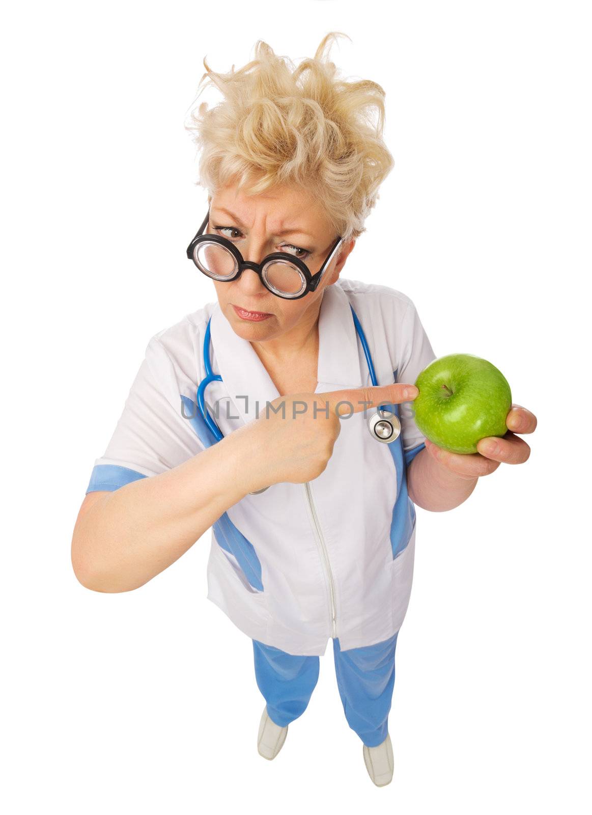 Funny mature doctor with apple isolated