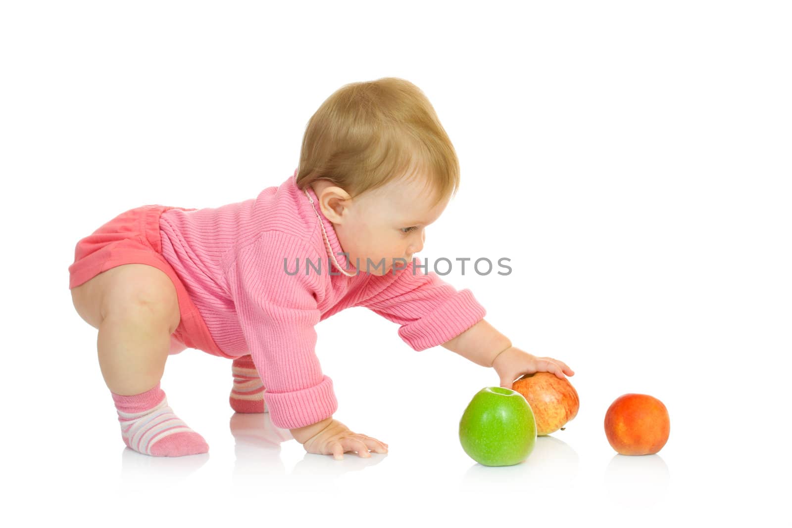 Small baby with apples