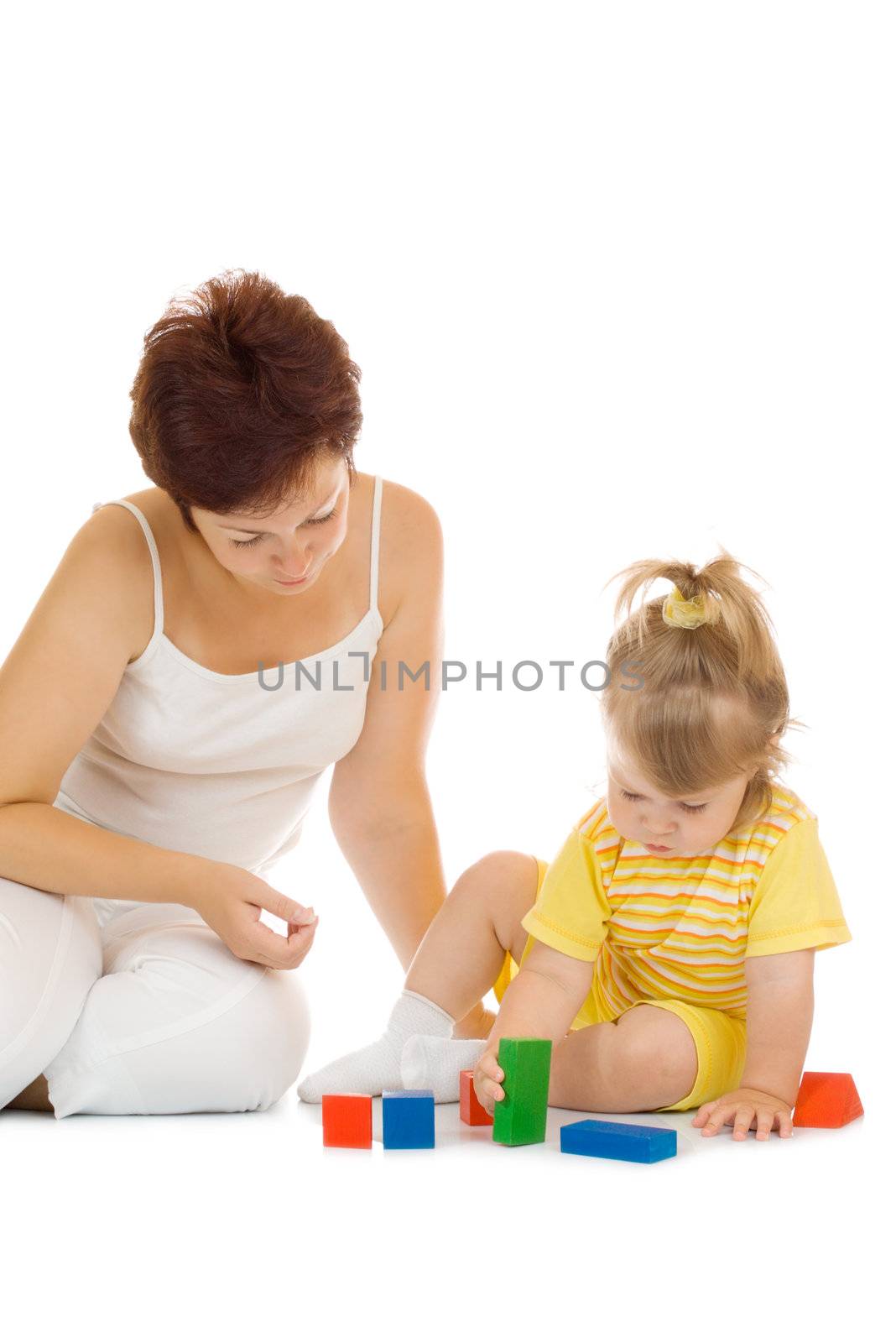 Small girl build pyramid with mother isolated